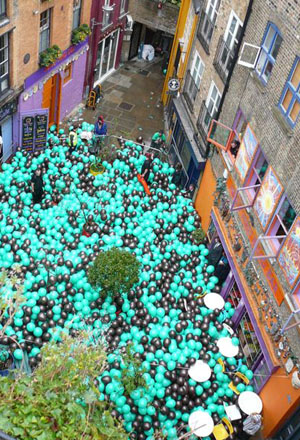 Balloons fill Neal's Yard as part of an ad campaign